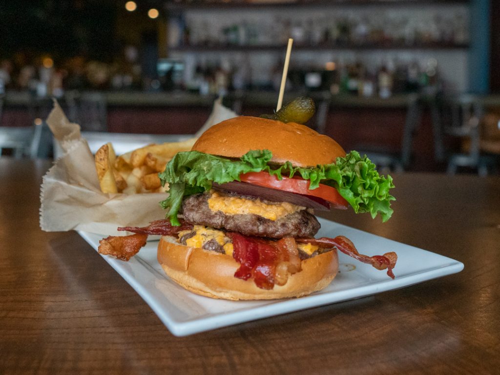 Busboys and Poets signature dishes Busboys Burger
Blackened Salmon
Shrimp & Chicken Chorizo Pasta